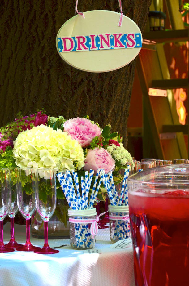 Pretty drinks table with flowers and fun straws